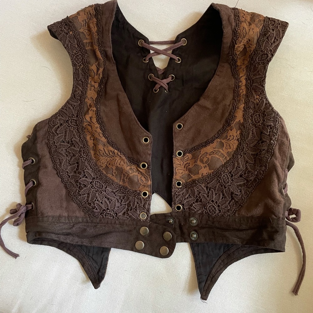 Renaissance lace vest.